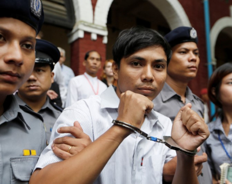 Myanmar judge convicts two Reuters reporters in landmark secrets case